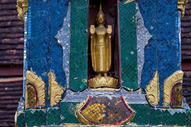 Small golden Buddha at Wat Xieng Tong, Luang Prabang, Laos