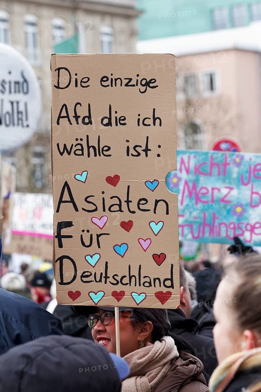 Banner against the AfD with original text, Asians For Germany, demonstration against right-wing extremism on 25 February 2025, Düsseldorf, North Rhine-Westphalia, Germany