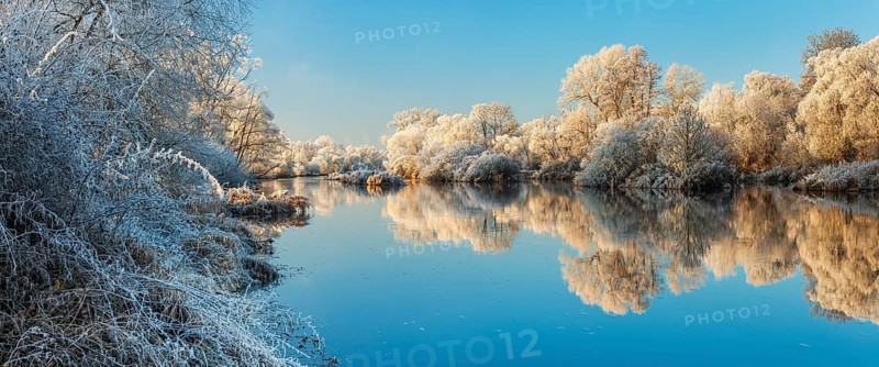 Landscape on the river Eder in winter, trees covered with hoarfrost, reflection in water, near Bad Wildungen, Hesse, Germany
