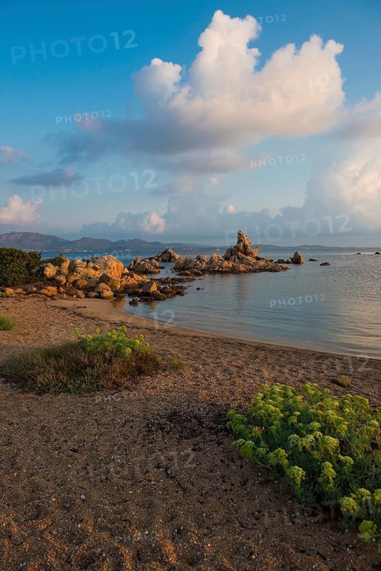 Lonely beach with granite rocks, sunrise, Spiaggia Poltu Manzu, Capo Ceraso, near Olbia, Sardinia, Italy