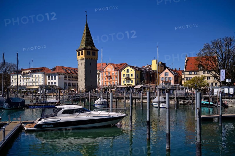 Boat dock, yachts, boats are moored in the harbor, behind it Mangturm, Hotel Bayerischer Hof, Hotel Lindauer Hof, Old Town, Lindau, Bavaria, Lake Constance, Germany