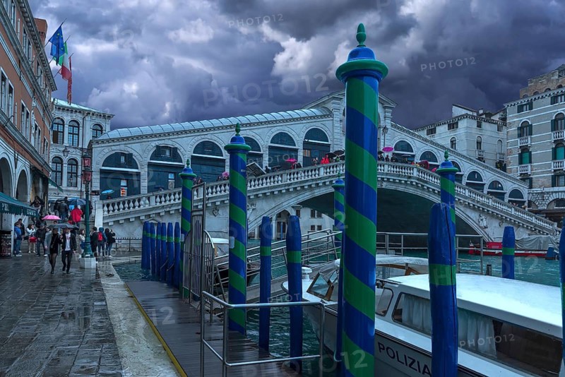 Rain clouds over the Rialto Bridge, Venice, Veneto, Italy