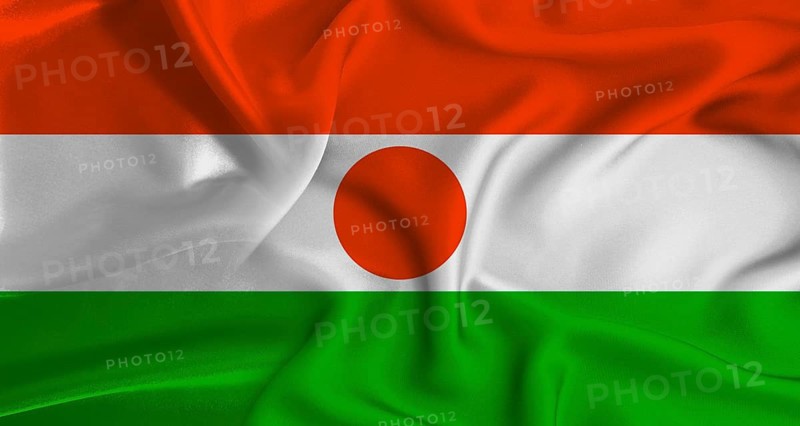 Realistic Niger flag waving. Close up of flag of Niger with cloth texture