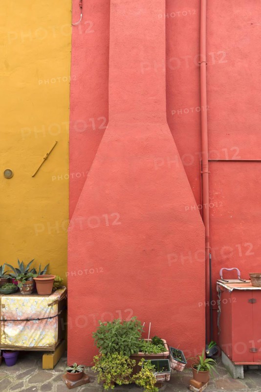 Colourful house facade with fireplace, Burano, Venice, Veneto, Italy