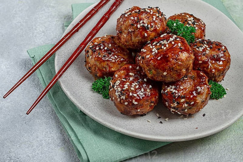 Tsukune, Japanese meatballs, minced chicken, fried on a skewer, with yakitori sauce, homemade, no people