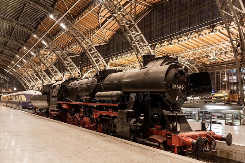 LEIPZIG, GERMANY - OCTOBER 8, 2018: Interior of the Leipzig Central Station with antique locomotive