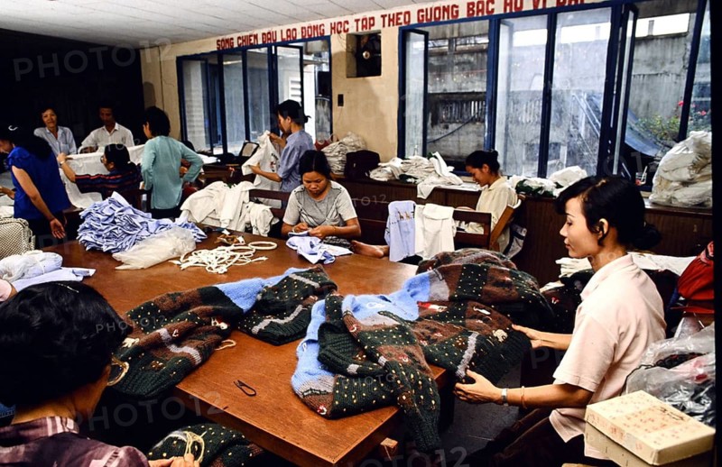 Seamstresses from a state-owned tailor's shop sew outerwear for Hungary