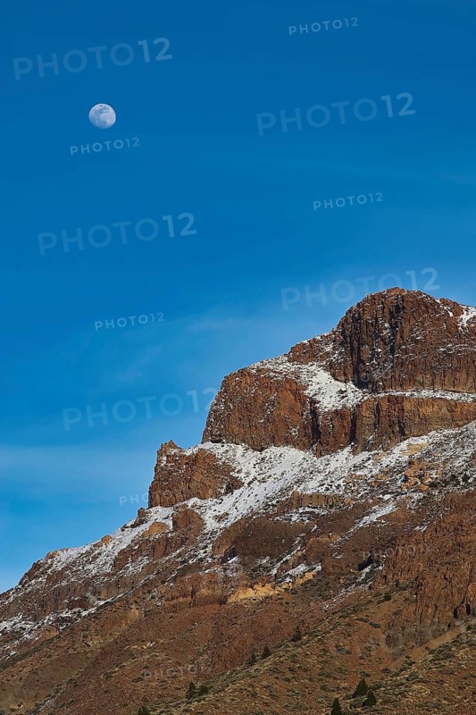 Moon over a snowy mountain peak under clear blue sky, Teide, Parque Nacional del Teide, Teide National Park, volcano, volcanism, UNESCO World Heritage Site, Tenerife, Canary Islands, Spain
