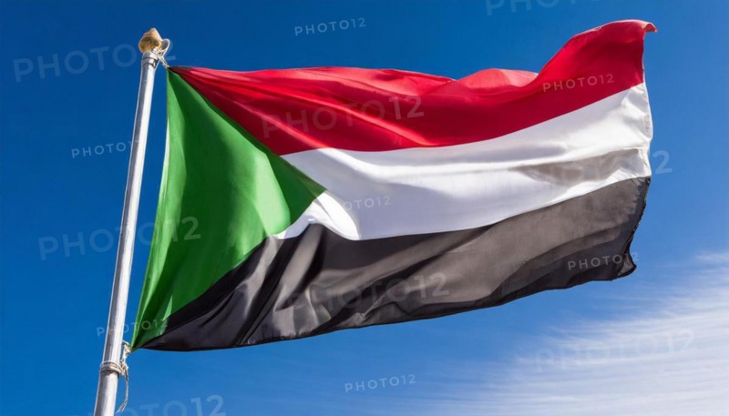 Flags, the national flag of Sudan flutters in the wind