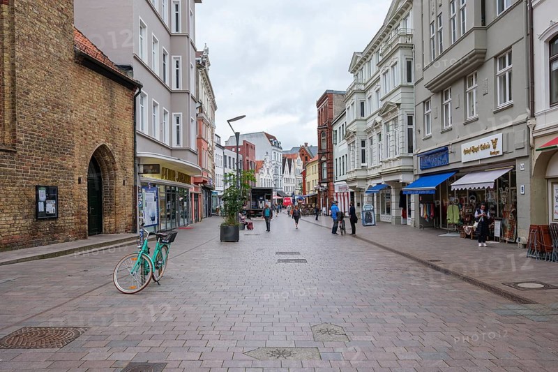 Busy shopping street with people and shops, Flensburg, Schleswig-Holstein, Germany