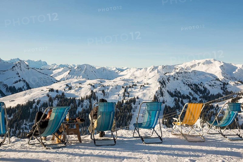 Snow-covered mountain landscape and deckchairs, Damüls, Bregenzerwald, Vorarlberg, Austria