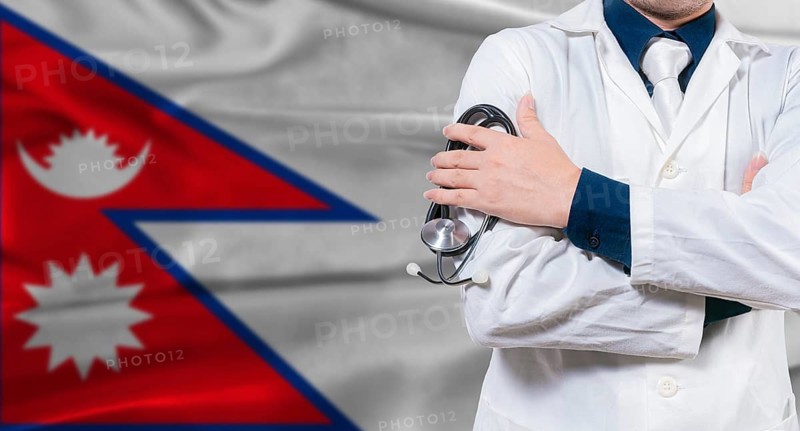 Nepalese national health system, Medical professional holding sthetoscope isolated