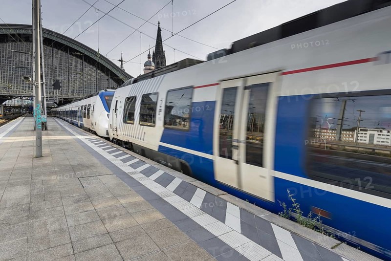 Local train leaving Cologne Central Station, Cologne, Rhineland, North Rhine-Westphalia, Germany