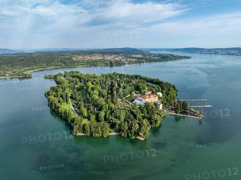 The island of Mainau in Lake Constance with the jetty and the baroque Mainau Castle, built between 1739 and 1746, with the village of Litzelstetten behind it, aerial view, Constance district, Baden-Württemberg, Germany