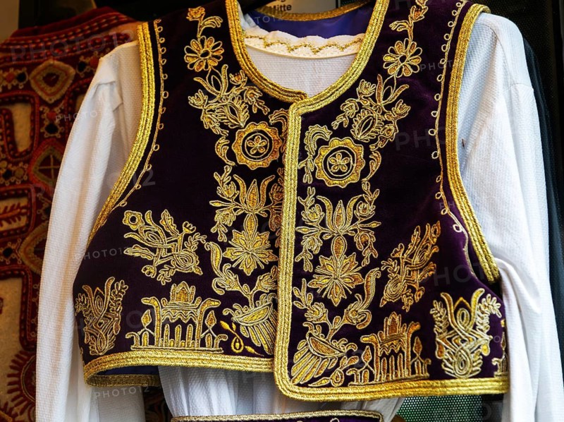 Detail of stitching of traditional textile clothing garment, Tirana, Albania