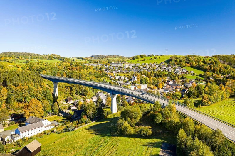 Aerial view of the village in autumn with bridge of the bypass of the federal road 101, Markersbach, Erzgebirge, Saxony, Germany