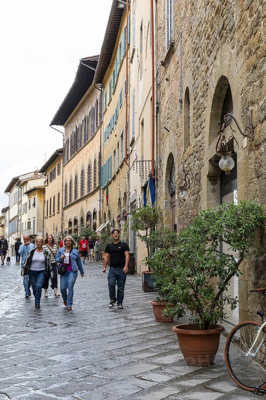 Typical shopping street in the medieval town of Arezzo, Tuscany, Italy