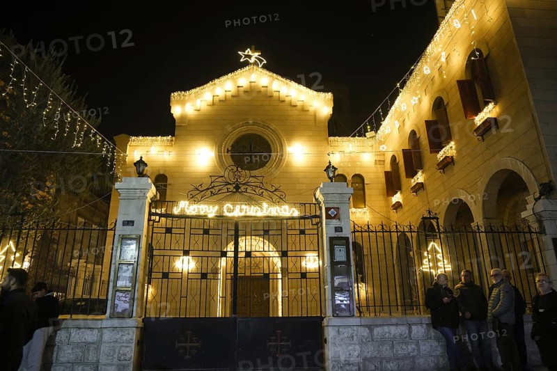 In Damascus, Syria, on December 25, 2025, festive scenes filled the streets and churches of the Bab Touma district, where thousands of people gathered to celebrate Christmas Eve amid holiday decorations and lights, Damascus, Damascus, Syria