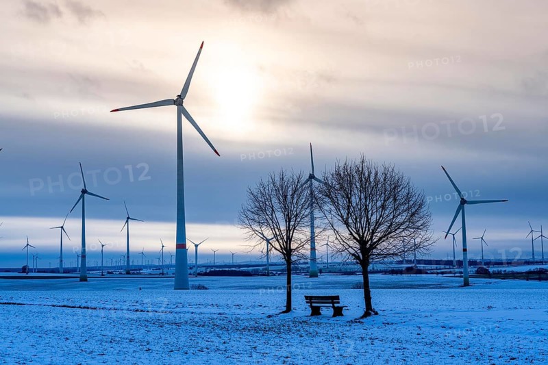 Wind farm, north of Lichtenau, self-proclaimed energy town, over 190 wind turbines and over 1200 solar panels generate 10 times as much electricity as the community of 11, 900 inhabitants consumes, largest onshore cluster of wind turbines in Germany, winter, slightly snow-covered landscape, North Rhine-Westphalia, Germany