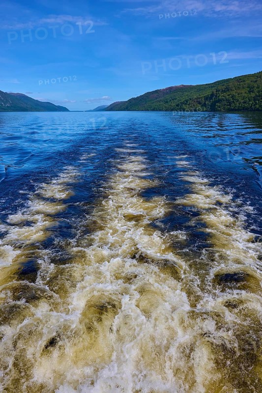 A river with current, wooded hills and a clear blue sky, Fort Augustus, Loch Ness, Scotland, United Kingdom, Great Britain