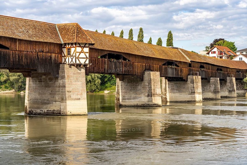 The longest covered wooden bridge in Europe, the Wooden Bridge Bad Säckingen over the Rhine river, Waldshut district, Baden-Württemberg, Germany | The Wooden Bridge over the Rhine river at Bad Saeckingen, longest covered wooden bridge in Europe, Bad Säckingen, Waldshut district, Baden-Württemberg, Germany