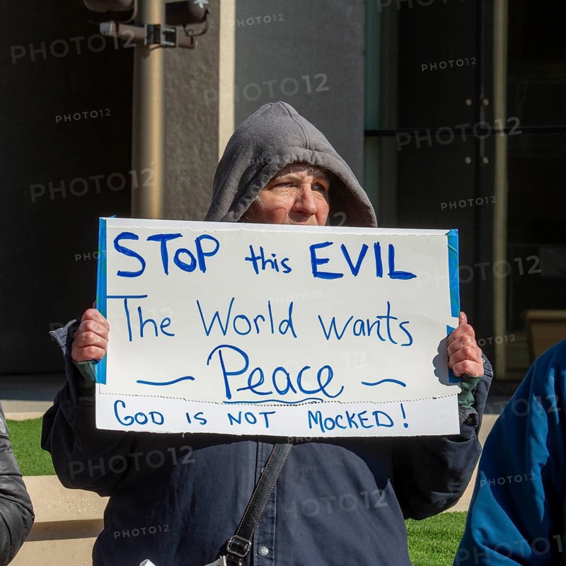 Detroit, Michigan USA - 7 April 2026 - People rally at the Federal Building to protest President Trump's threat to bomb all bridges and power plants in Iran. Trump has said he will wipe out a whole civilization if Iran does not agree to reopen the Strait of Hormuz