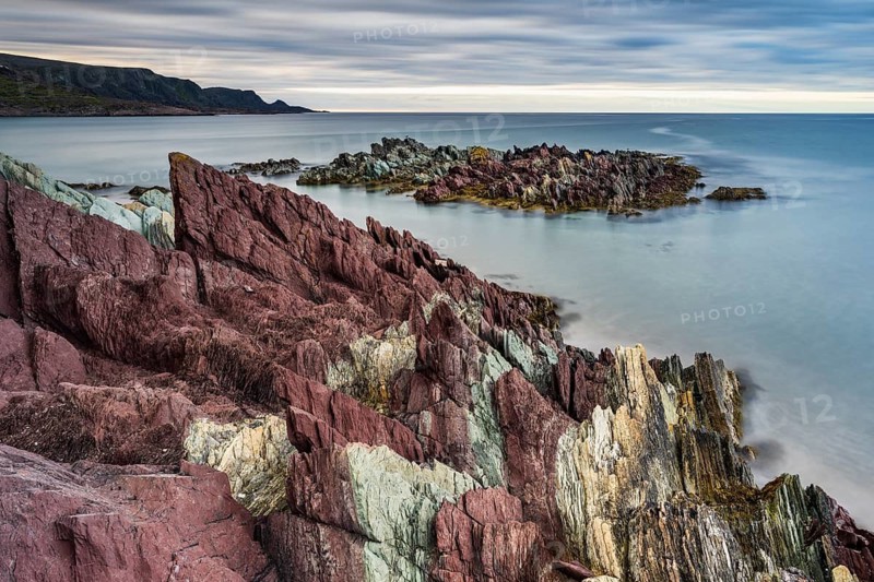 Colourful rocks on the coast, Varanger, Barents Sea, Finnmark, Norway