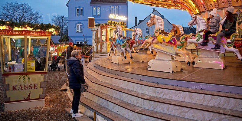 Cranger Weihnachtszauber with Alt Wiener horse carousel, Christmas funfair in the Ruhr area, Herne, North Rhine-Westphalia, Germany