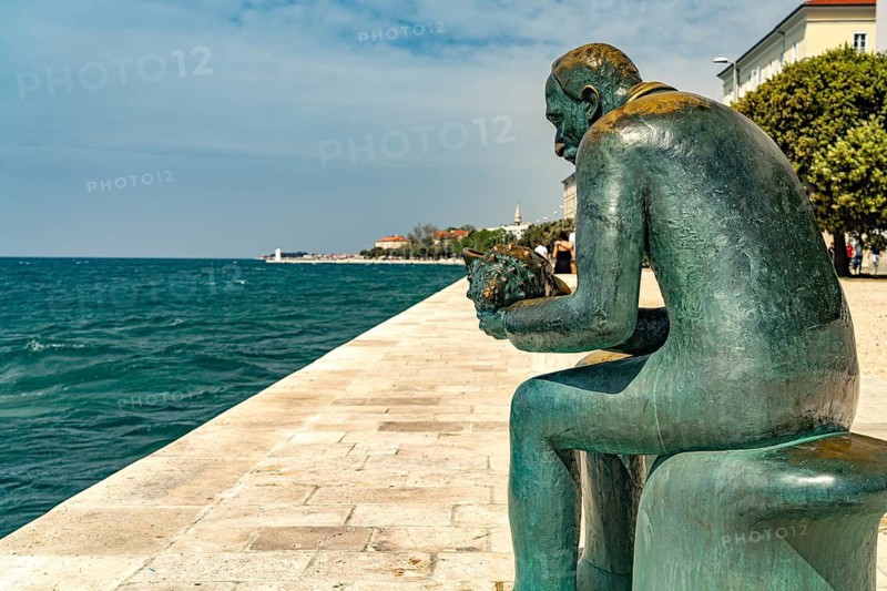 Statue of Spiridon Brusina on the promenade in Zadar, Croatia