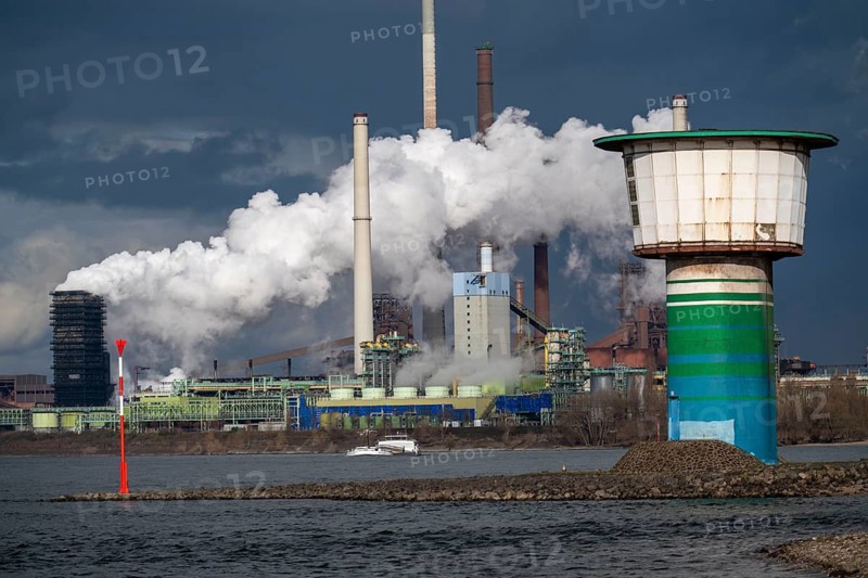 Rhine at Duisburg Bruckhausen, Marxloh, Thyssenkrupp Steel steelworks, blast furnaces, sintering plant, discharge plume of the Schwelgern coking plant, well tower of the Walsum waterworks, Duisburg, North Rhine-Westphalia, Germany