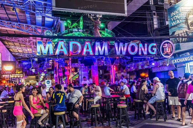 Crowds of people on Bangla Street in the evening. Nightlife on Bangla Walking Street with go-go bars, clubs, cannabis bars and extreme loudness. Patong, Kathu, Phuket Island, Thailand