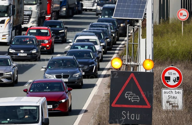 Oberhausen, North Rhine-Westphalia, Germany, traffic jam on the A3 motorway, Easter travel traffic, cars, vans, trucks, caravans and campers are stuck in the traffic jam