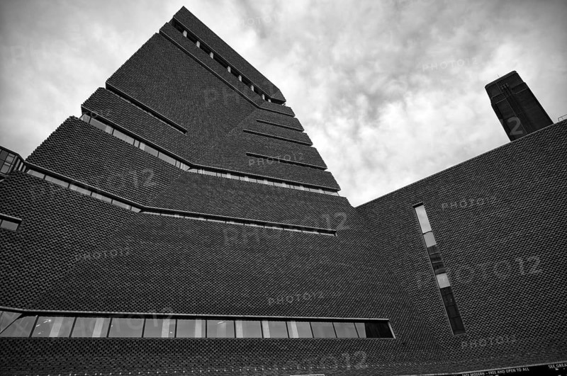 Façade of the Tate Gallery of Modern Art, former combined heat and power plant, Bankside, Southwark, black and white, London, England, Great Britain