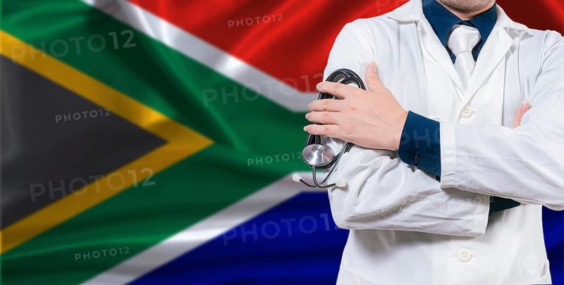 South African national health system, Medical professional holding sthetoscope isolated