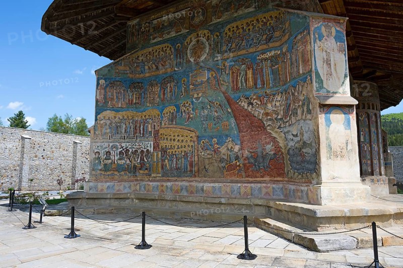 Church façade with impressive frescoes and icons in the open air, exterior view, Saint George Monastery, Voronet Monastery, UNESCO World Heritage Site, Suceava District, Bukovina Region, Moldova, Romania