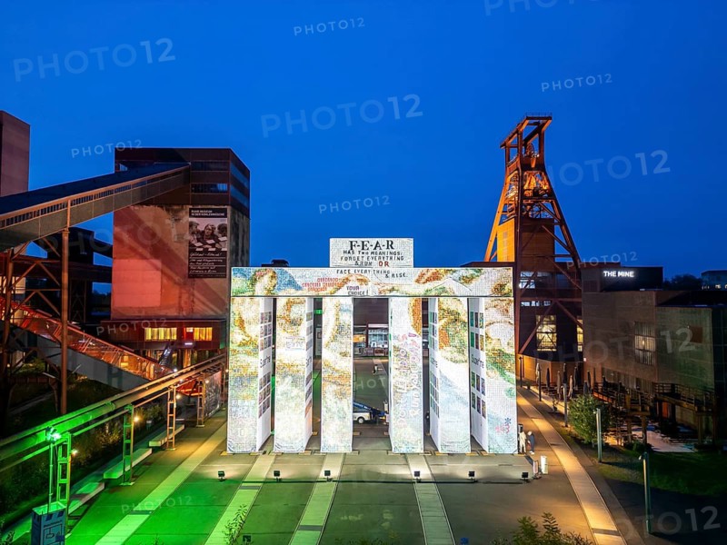 Temporary art installation Global Gate at the UNESCO World Heritage Site Zeche Zollverein, interpretation of the Brandenburg Tor tor made of 37 freight containers, created as part of the KI Biennale, artistically designed by the artist Super*me, developed by Marcus shepherd, stands on the Zollverein site, EssenNorth Rhine-Westphalia, Germany until 30.03.25