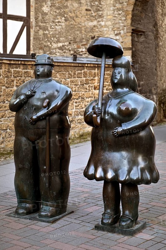 Bronze sculptures entitled Man with stick, Woman with umbrella by Fernando Botero, Goslar, Lower Saxony, Germany