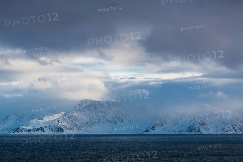 Snowy mountains on the Norwegian Sea, Loppa, Finnmark, Norway, March 2019