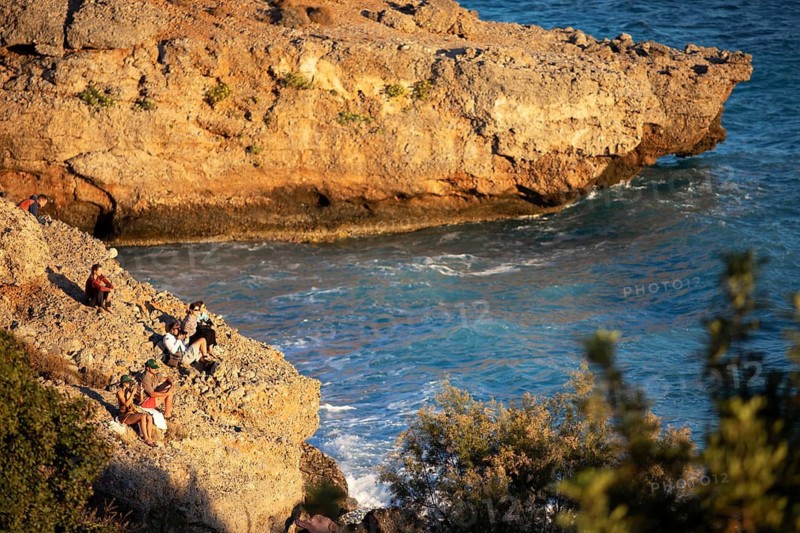 Orange rocks on Koutelo Beach or sunset beach on the Libyan Sea, Vouvas near Chóra Sfakion, Chania Regional Unit, Sfakia Municipality, Crete, Greece