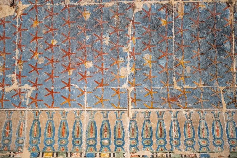 Ancient Egyptian art of the interior ceiling, painting of stars and night sky, Temple of Hatshepsut, Luxor, Egypt