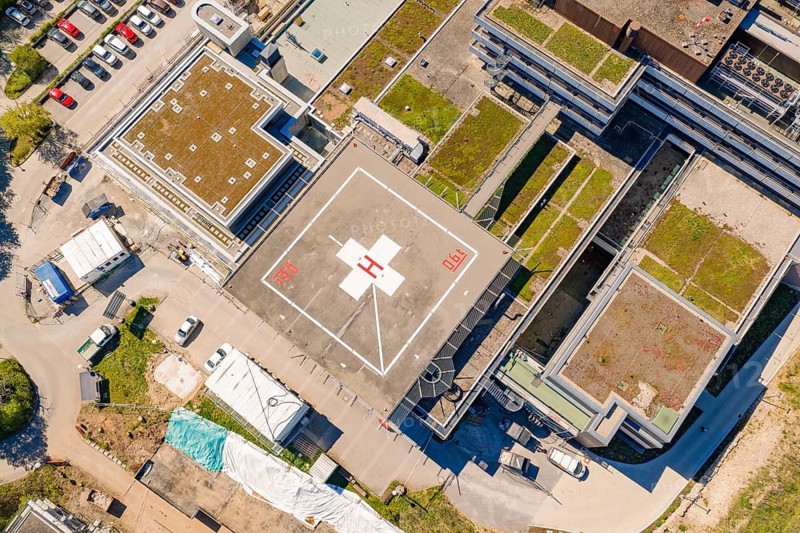 Complex urban building with helipad and green roofs from a bird's eye view, Nagold Hospital of the Southwest Clinic Network, Calw district, Germany