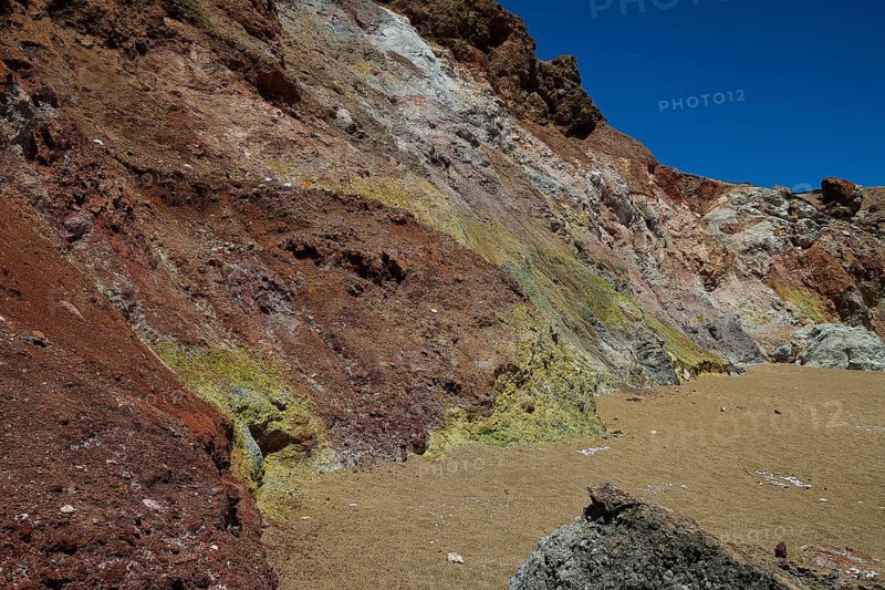 Versatile play of colors in the geological structure with dominant earth tones, Paliochori beach, Paliochori, volcanic rock, copper, nickel, mineral salts, volcanic island, Milos, Cyclades, Greek islands, Greece