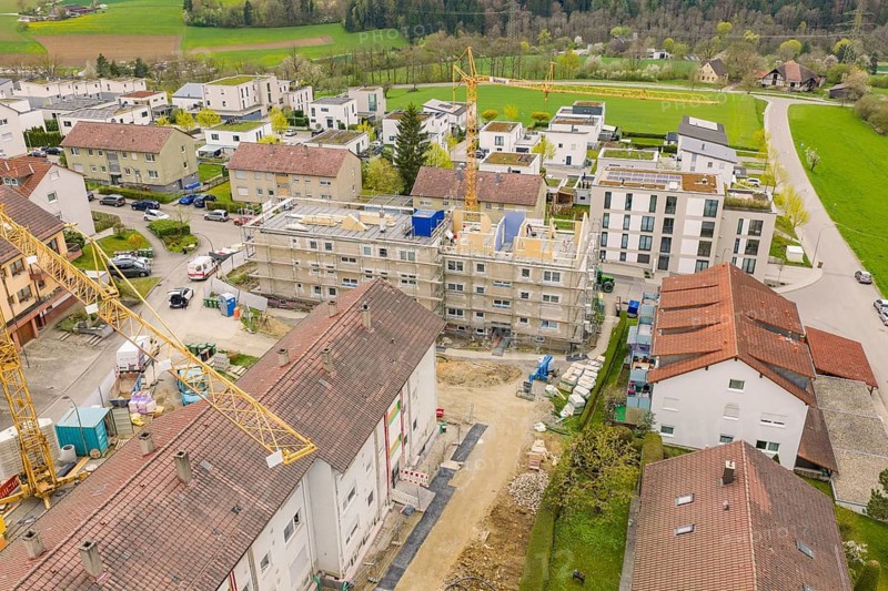 Aerial view of construction site in residential area with surrounding buildings and landscape, residential renovation, Nagold, Calw district, Germany