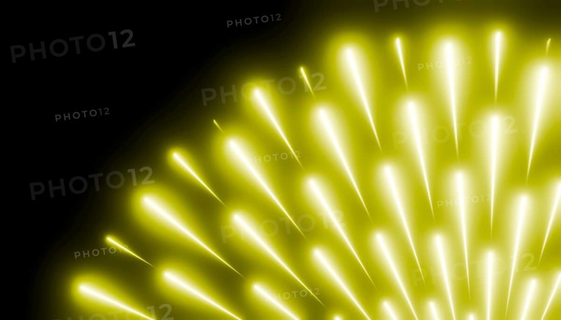 Abstract rendering featuring vibrant yellow light beams radiating from a central point against a dark background. Perfect for festive, energetic, or dynamic designs
