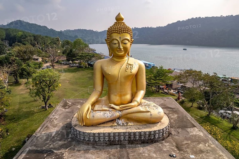 The big Buddha of Wat Ao Salat in the fishing village of Ban Ao Salad seen from the air, Ko Kut Island or Koh Kood Island in the Gulf of Thailand