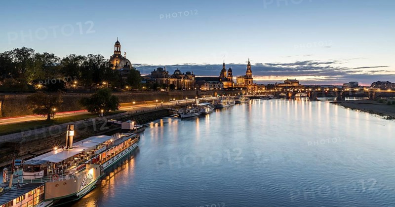 City view with Elbe in the evening, illuminated silhouette at blue hour, Dresden, Saxony, Germany