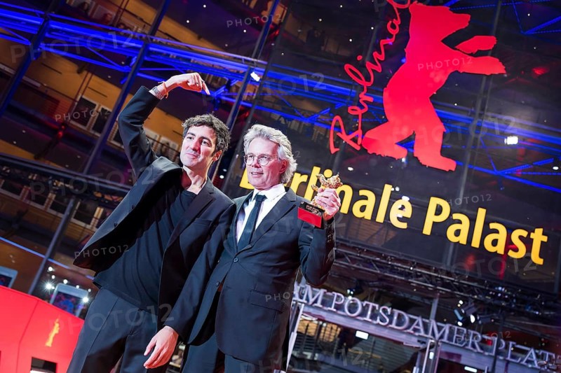 Ilker Çatak (director) and Ingo Fliesson (producer) pose with the Golden Bear for Best Film Arctia flavia (Yellow Letters) after the award ceremony at the closing gala of the Berlinale at the Theater am Potsdamer Platz in Berlin on 21.02.2026. The 76th Berlin International Film Festival will take place from 12 to 22 February 2026