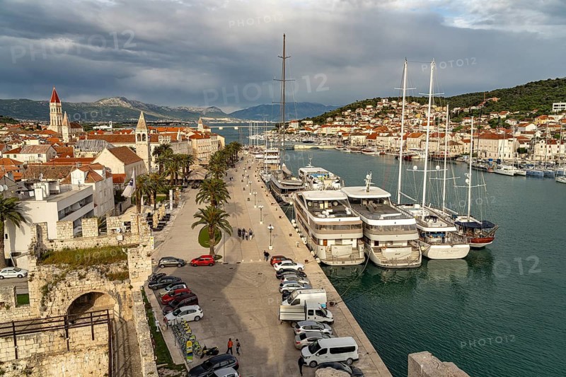 View from Kamerlengo Fortress to the boats on the Riva Promenade and the old town centre of Trogir, Croatia