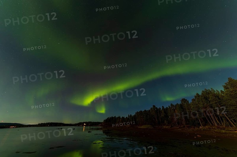 Northern lights, (Aurora borealis) at a lake near Kiruna, September 2024, Lapland, Sweden