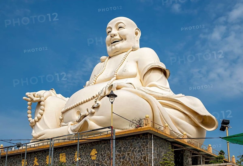 Statue of Budai - Laughing Buddha, Vinh Trang Temple, My Tho, Mekong Delta, Vietnam